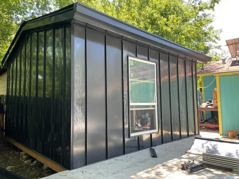 Black standing seam metal wall panels for Metal Roof Installation in Pevely